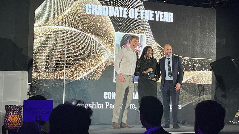 Anoushka Pacquette accepting the NextGen BCO award on stage