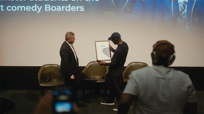 Mykaell Riley receiving RSL Fellowship