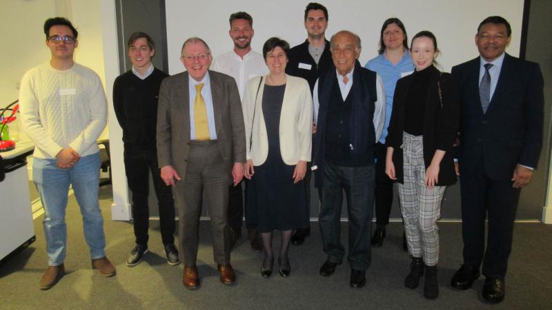 Picture of attendees posing for a group photo at the Transport Studies Research Group anniversary event.