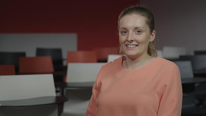 Female student smiling at camera