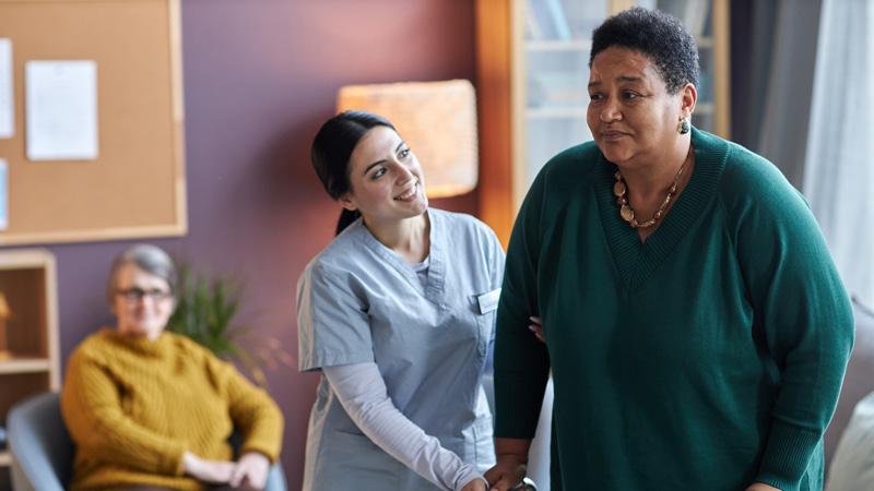 Nurse caring for an ethnic minority patient in a hospital setting