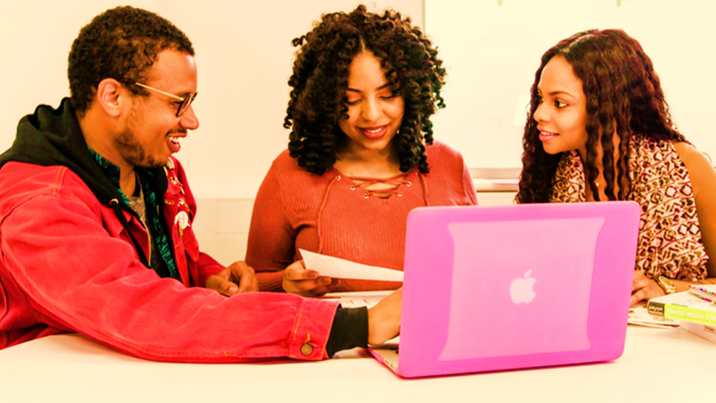 Students working on a laptop