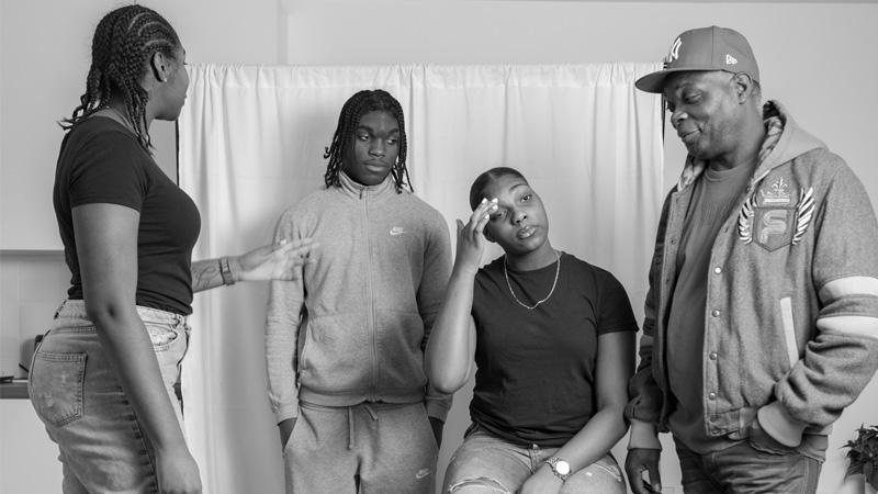 Ryan Prince's photography of four black people of all ages casually speaking