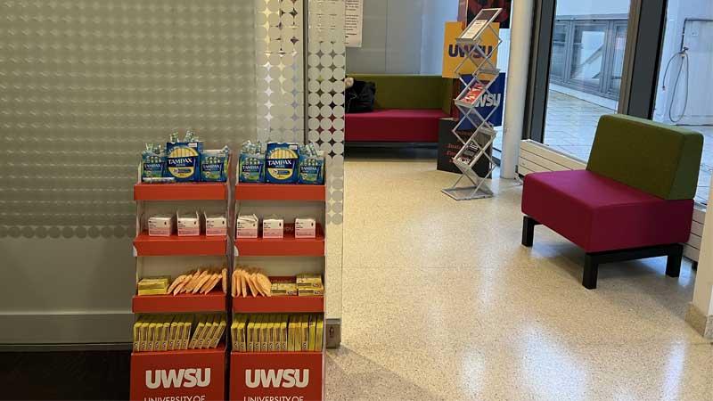 Stands of free sanitary products on campus