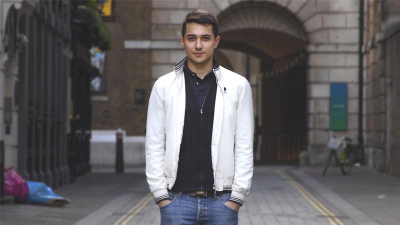 Student Alexandr Zhexembayev standing in London