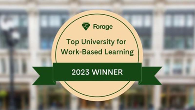 Top University for Work-Based Learning 2023 Winner badge, with Regent's Campus front blurred in the background