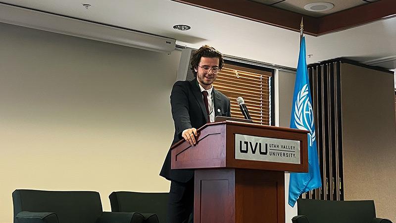 Kian Richardson presenting at the first UN International Academic Conference in America