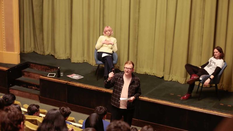 Actors speak to students during a drama workshop at Regent Street Cinema