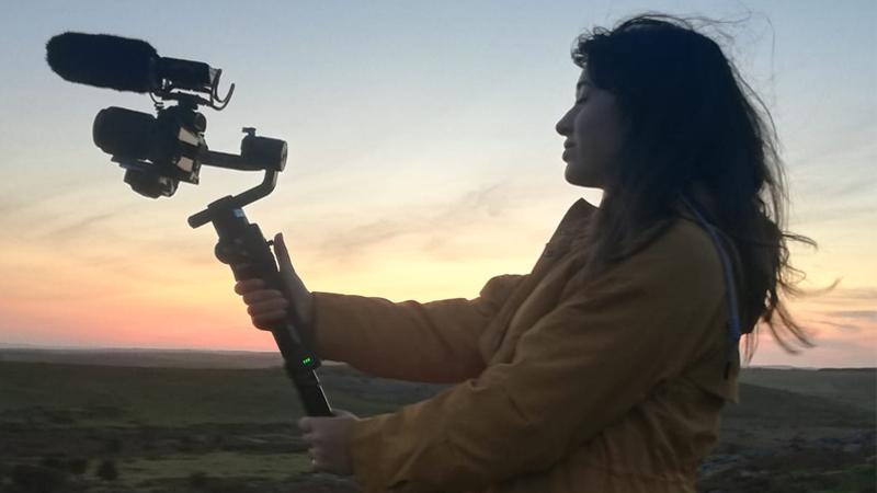 Student Angelica Bizzotto holding filming equipment