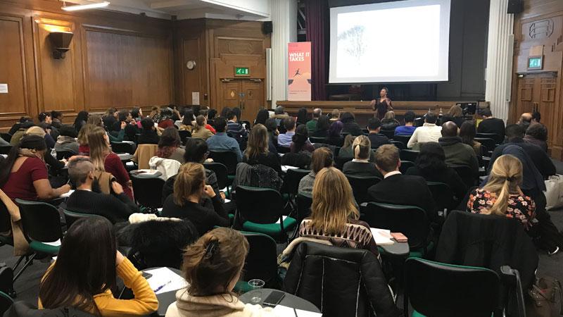 audience-shot-of-her-talking-at-the-front