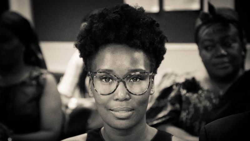 Black and white headshot of alumna Ayanna Deane.