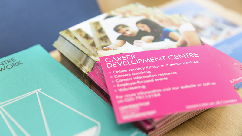 Career development centre pile of brochures