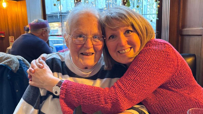 Catherine Loveday (right) hugging her mum (left)