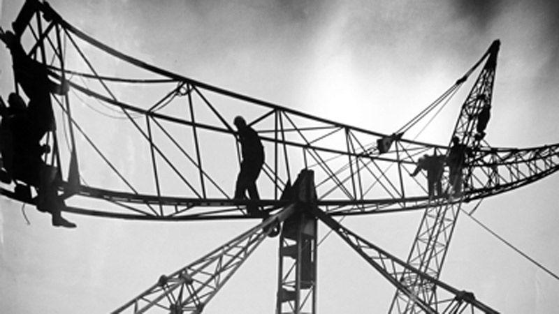 Crane erectors on laing Barbican site