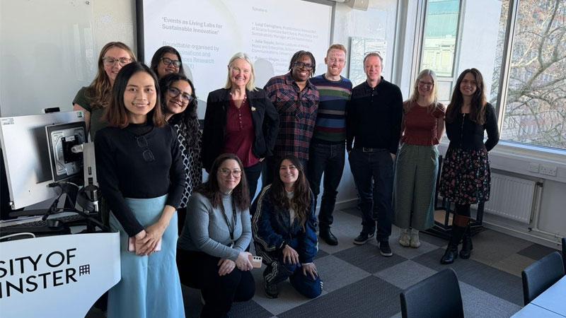 Group photo of attendees at the DEX roundtable event