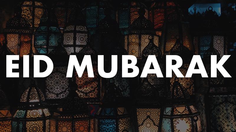 Lanterns with words Eid Mubarak layered on top
