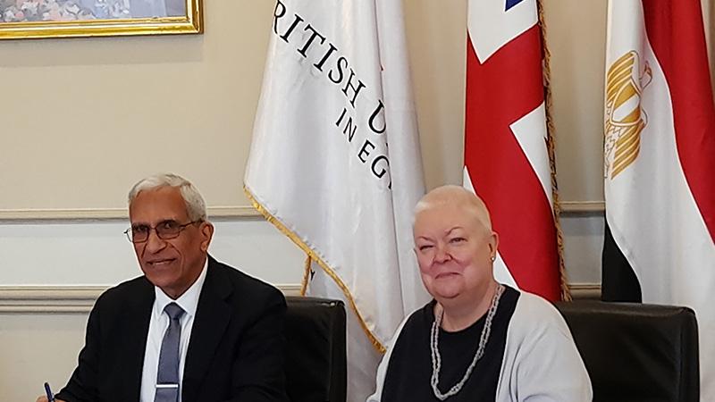 Professor Alex Hughes and Professor Yehia Bahei-El Din signing Memorandum of Understanding
