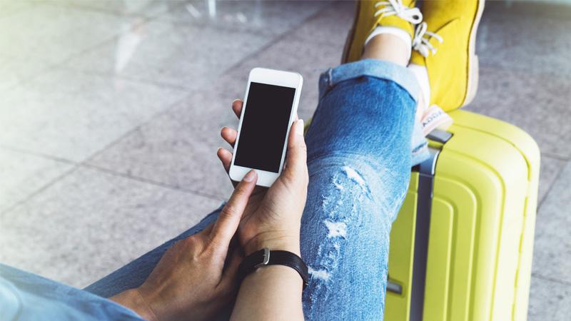 person-on-holiday-with-phone