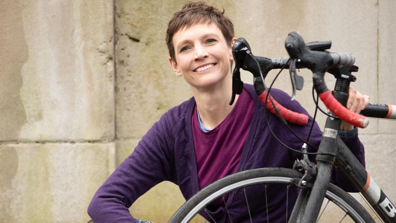 Professor Rachel Aldred posing with bike