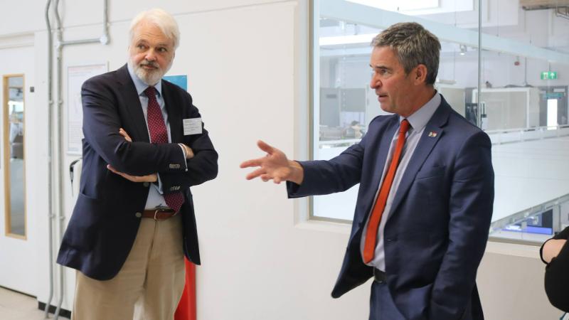 Picture of Richard Burge on the left and Peter Bonfield on the right in conversation.
