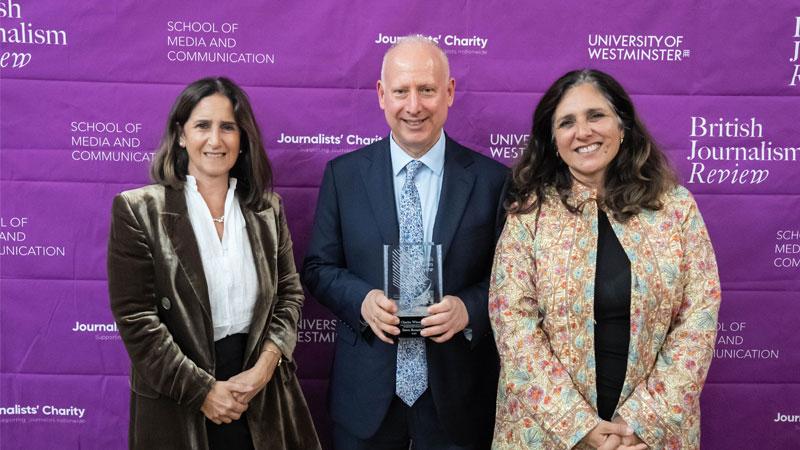 Steve Rosenberg holding his trophy (centre) with Marina Wheeler (left) and Shirin Wheeler (right)