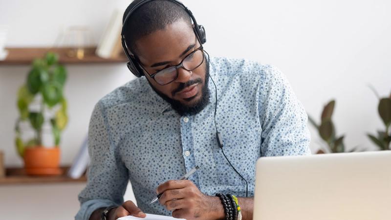 Student attending a webinar