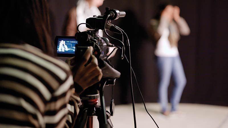 student with camera Thumbnail