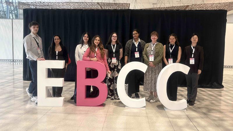 Westminster students standing in front of large letters reading E B C C