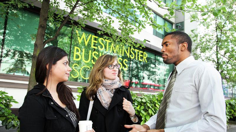 Three students stood outside Westminster Business School Marylebone Campus