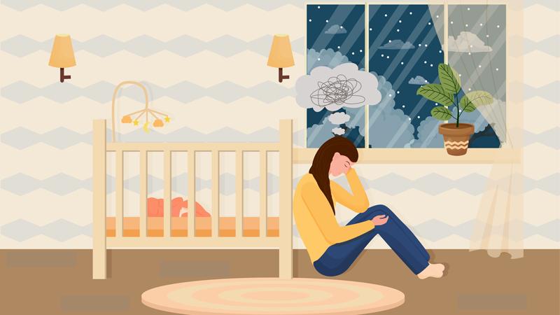 Woman sitting on floor showing negative thoughts near baby's cot with sleeping baby inside it