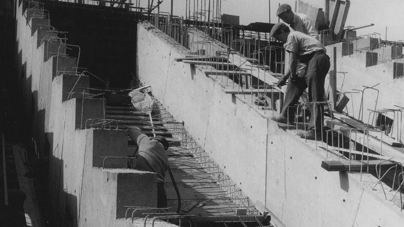 Workers on a staircase construction site