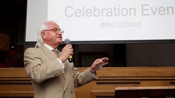 A man speaking into a microphone