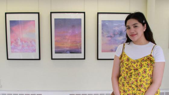 Angel Bacani with her work As The Sun Sleeps