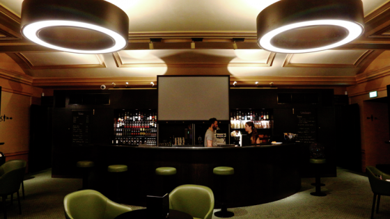 Wide image of the Regent Street Cinema in-house bar and chairs