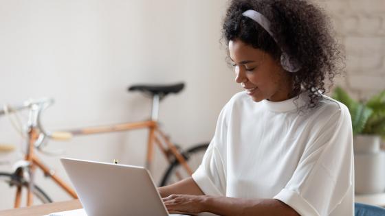 A female student using a laptop