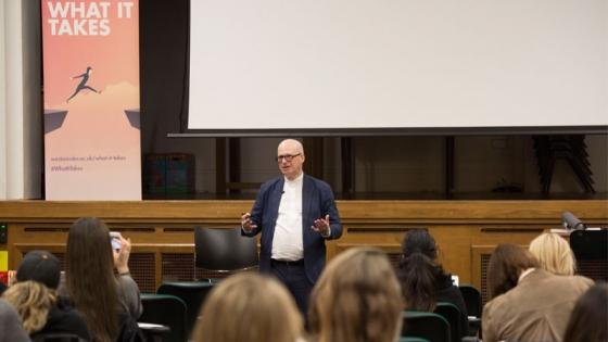 Roger Mavity presenting in front of an audience