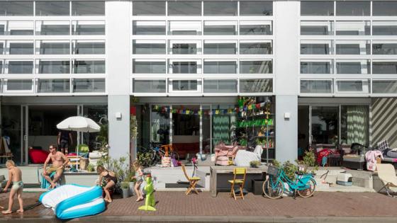 People next to a swimming pool