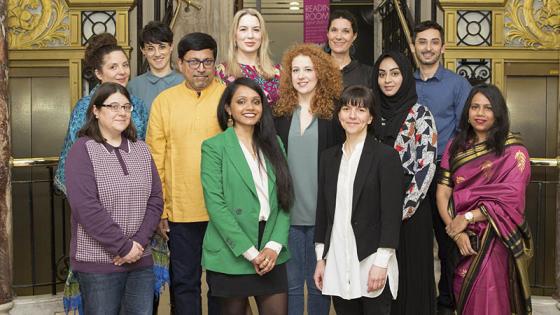 A group of people posing for a photograph at the annual reception