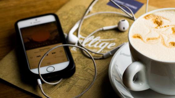 a phone screen playing a podcast