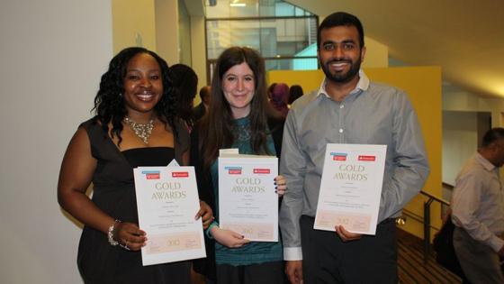 Three Westminster students with Gold Award certificates